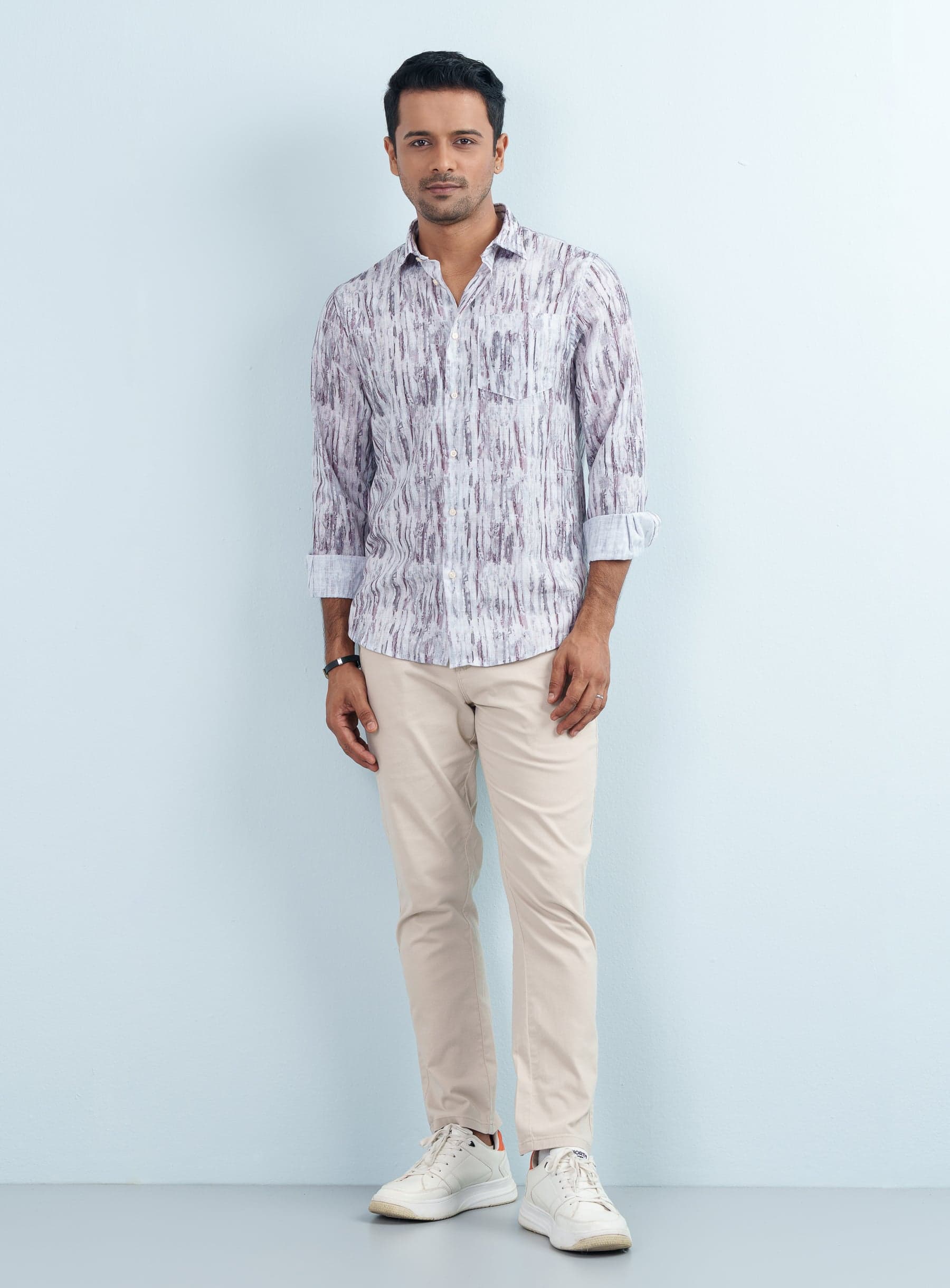 Front view of a man wearing an Off-White &amp; Purple Textured Pattern casual shirt full sleeve with rolled cuffs.